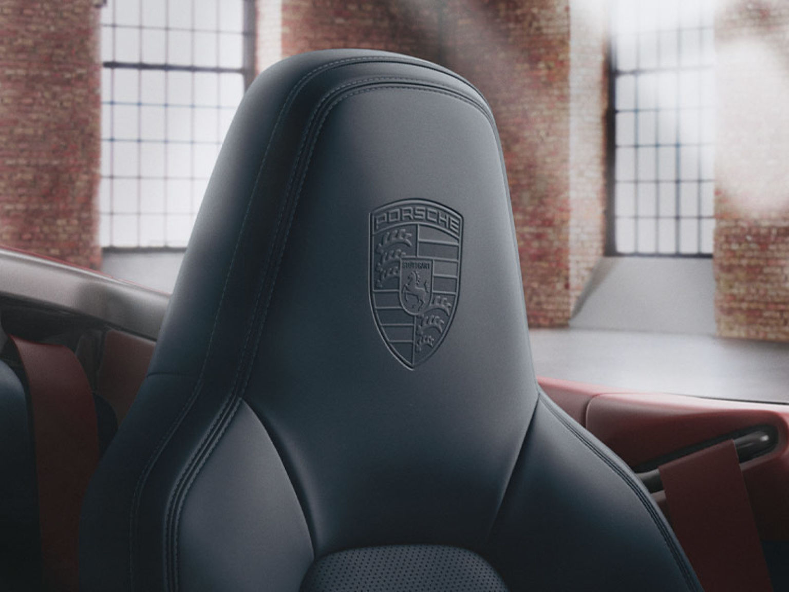 Герб Porsche на підголівниках